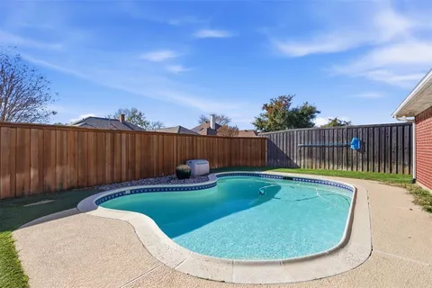 a view of a backyard with a slide