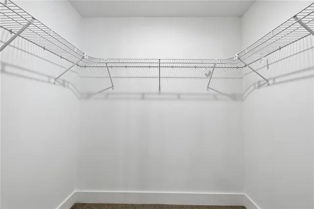 a view of a room with racks on the wall