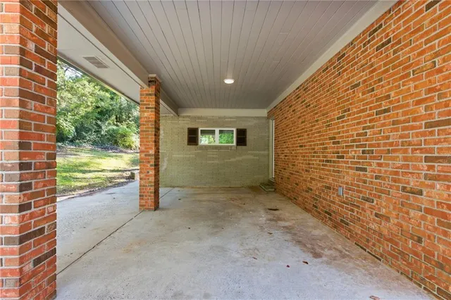 a view of an empty room and window