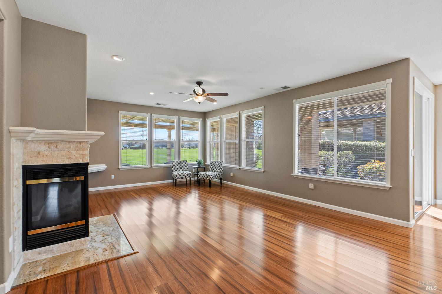 309 Southern Hills Drive Rio Vista, CA 94571 - Photo 11 of 73 a view of empty room with fireplace and wooden floor