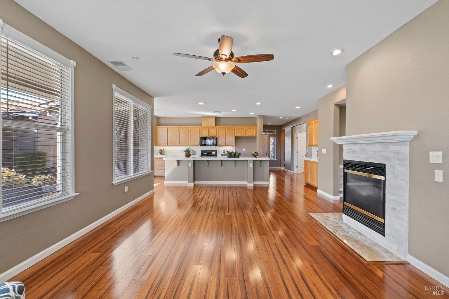 309 Southern Hills Drive Rio Vista, CA 94571 - Photo 12 of 73 a view of a living room and kitchen with wooden floor