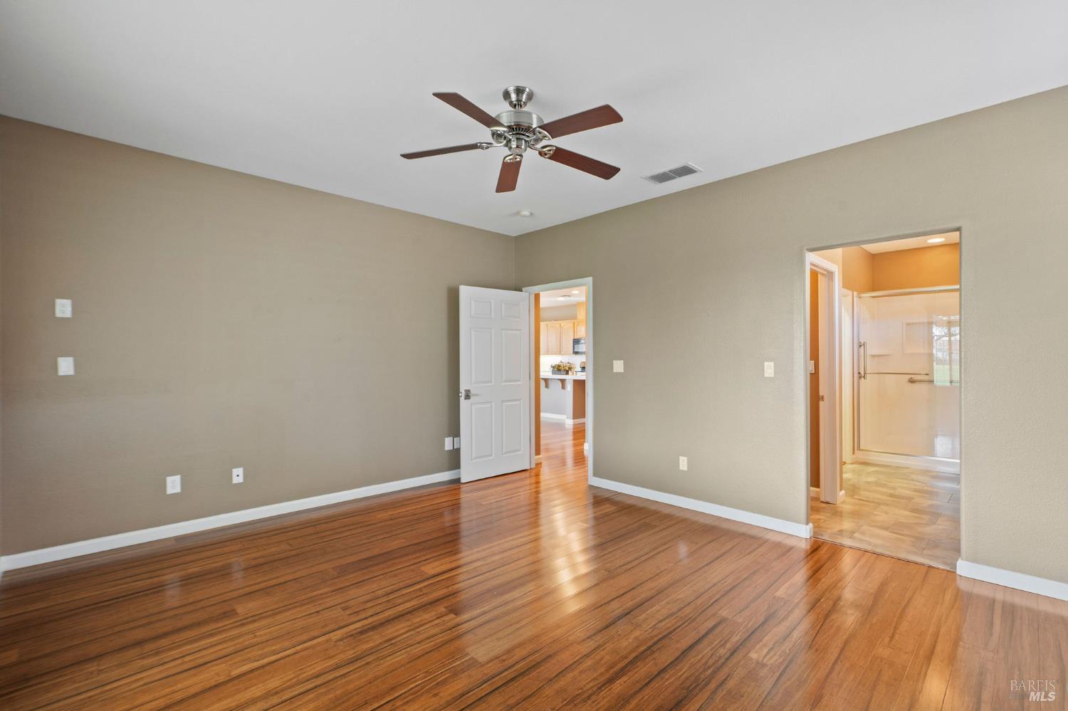309 Southern Hills Drive Rio Vista, CA 94571 - Photo 17 of 73 wooden floor in an empty room with a window