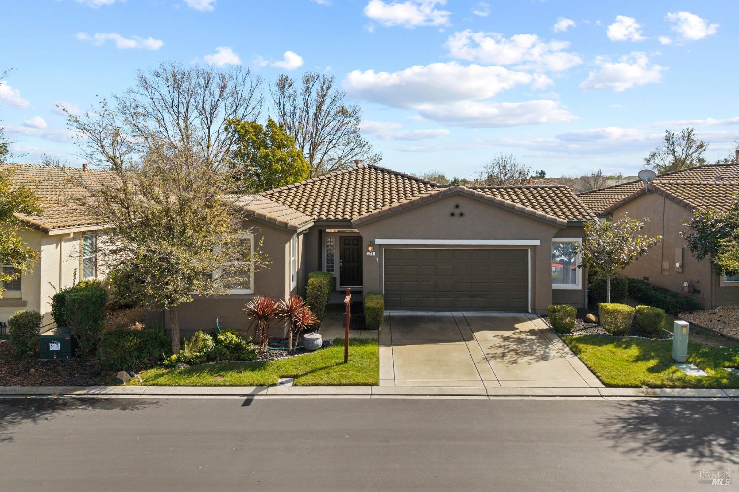 309 Southern Hills Drive Rio Vista, CA 94571 - Photo 2 of 73 a front view of a house with a garden and trees