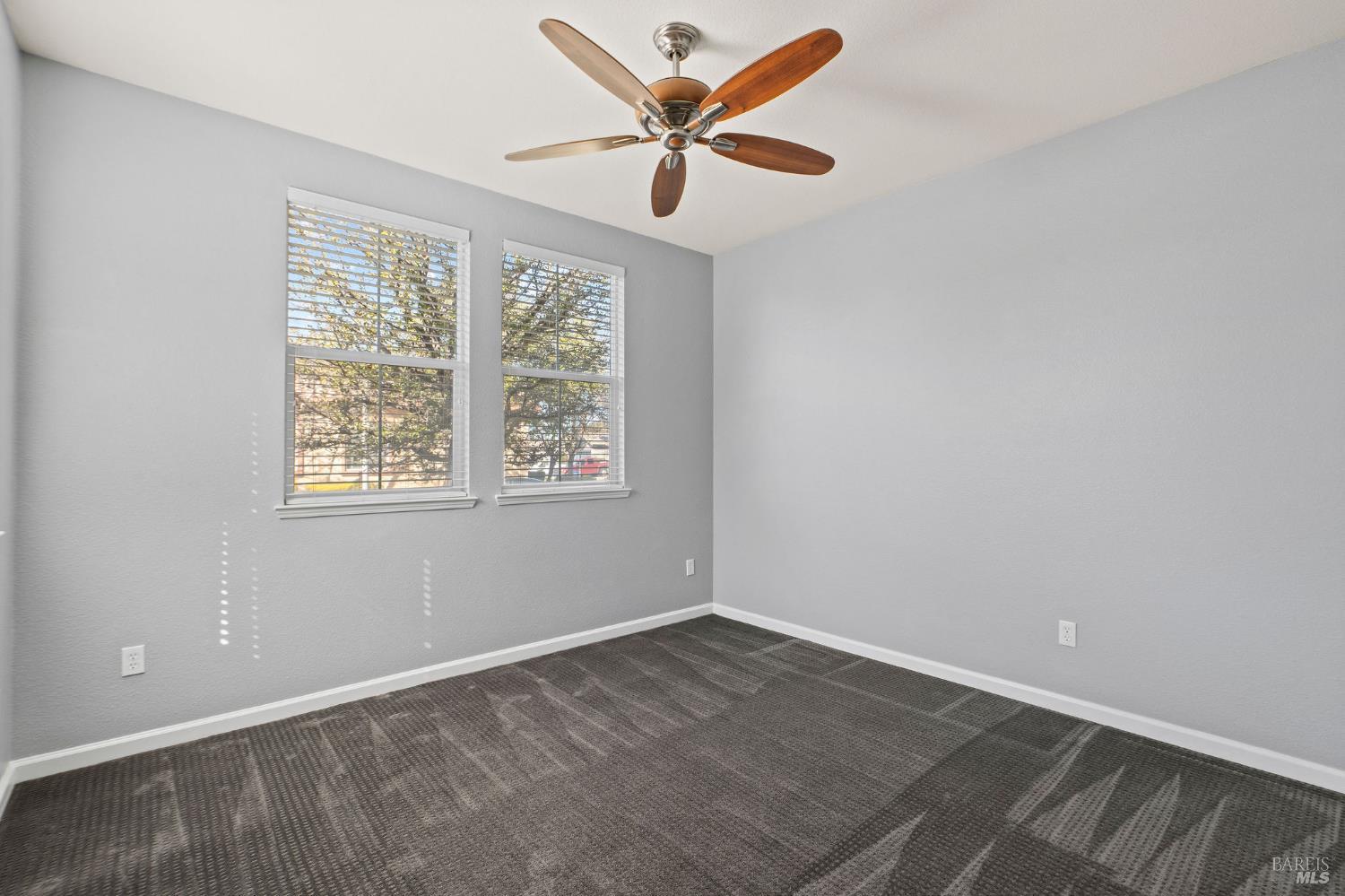 309 Southern Hills Drive Rio Vista, CA 94571 - Photo 22 of 73 an empty room with windows and fan