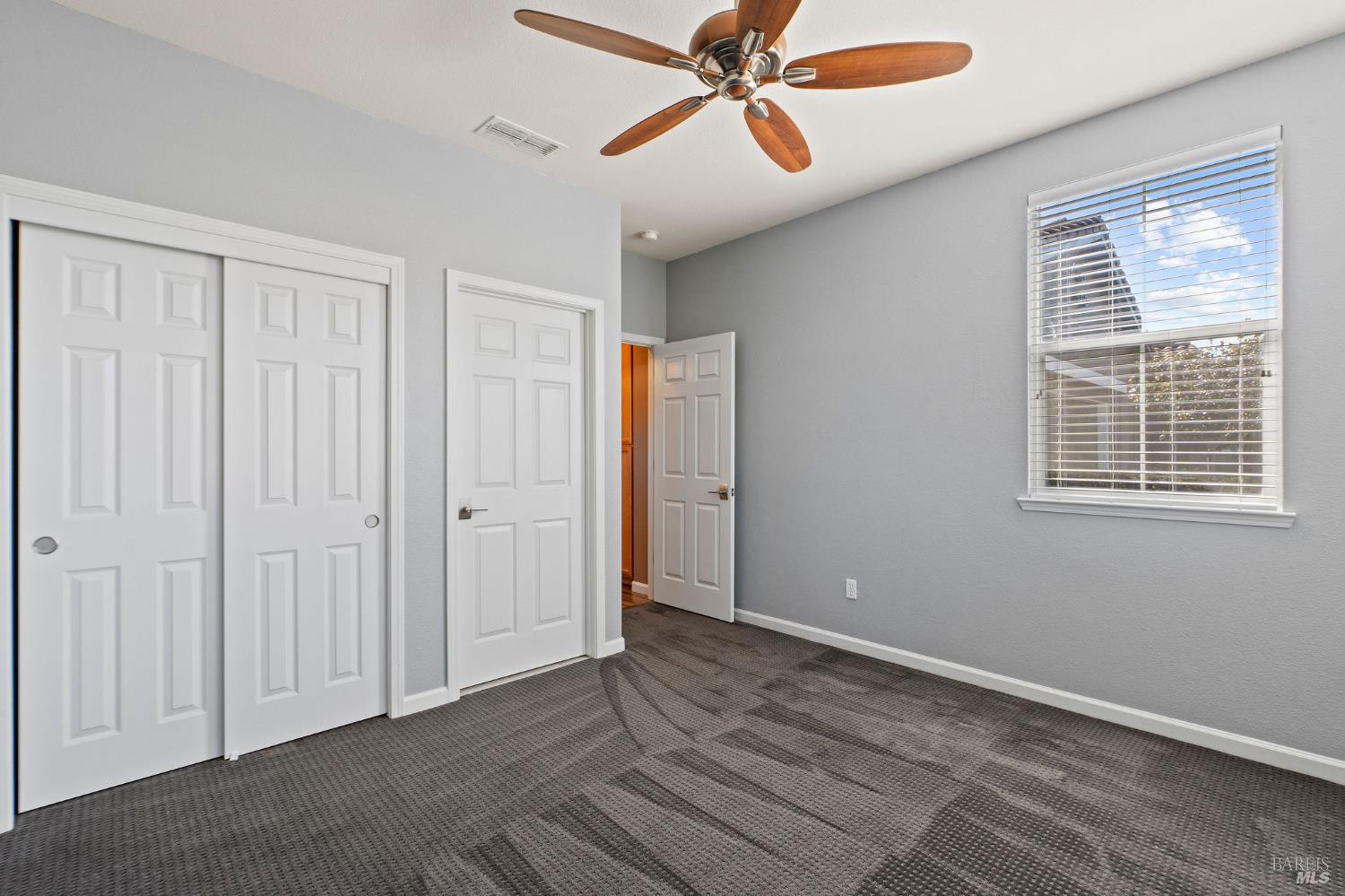 309 Southern Hills Drive Rio Vista, CA 94571 - Photo 23 of 73 a view of a room with a ceiling fan and window