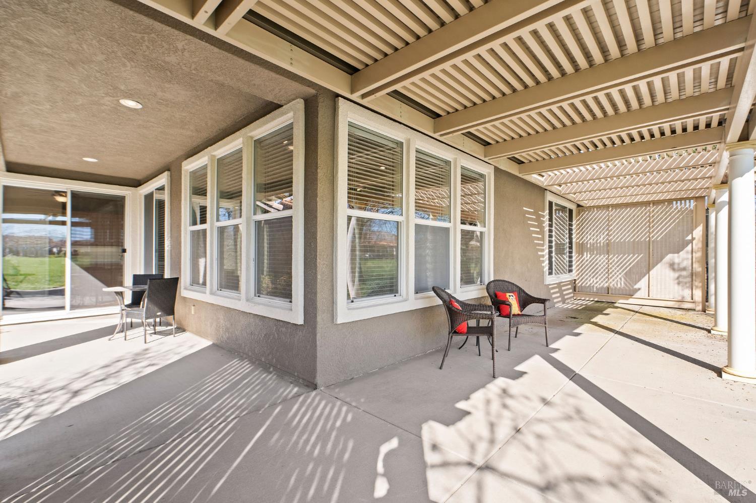 309 Southern Hills Drive Rio Vista, CA 94571 - Photo 28 of 73 a view of a patio with a table chairs and wooden floor