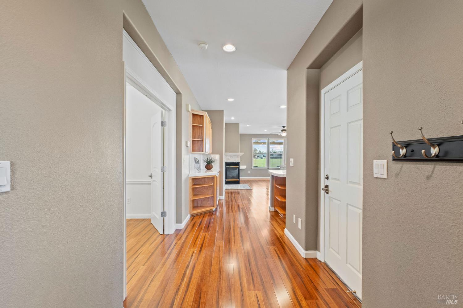 309 Southern Hills Drive Rio Vista, CA 94571 - Photo 72 of 73 a view of a living room with kitchen island wooden floor and stainless steel appliances