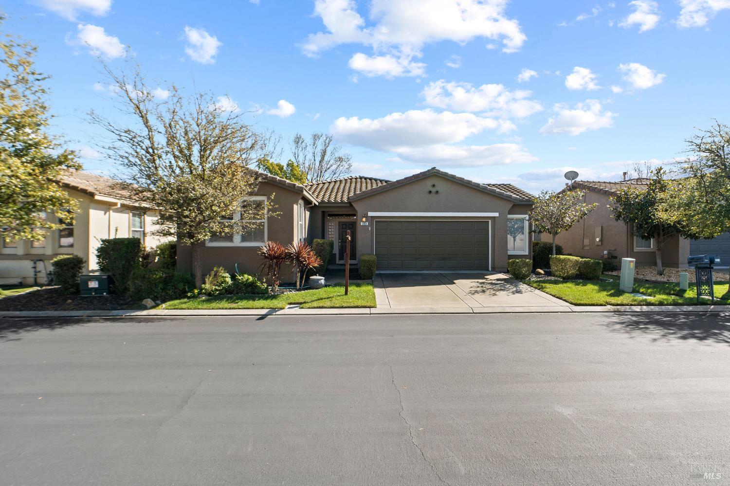 309 Southern Hills Drive Rio Vista, CA 94571 - Photo 40 of 73 a front view of a house with a garden and pathway