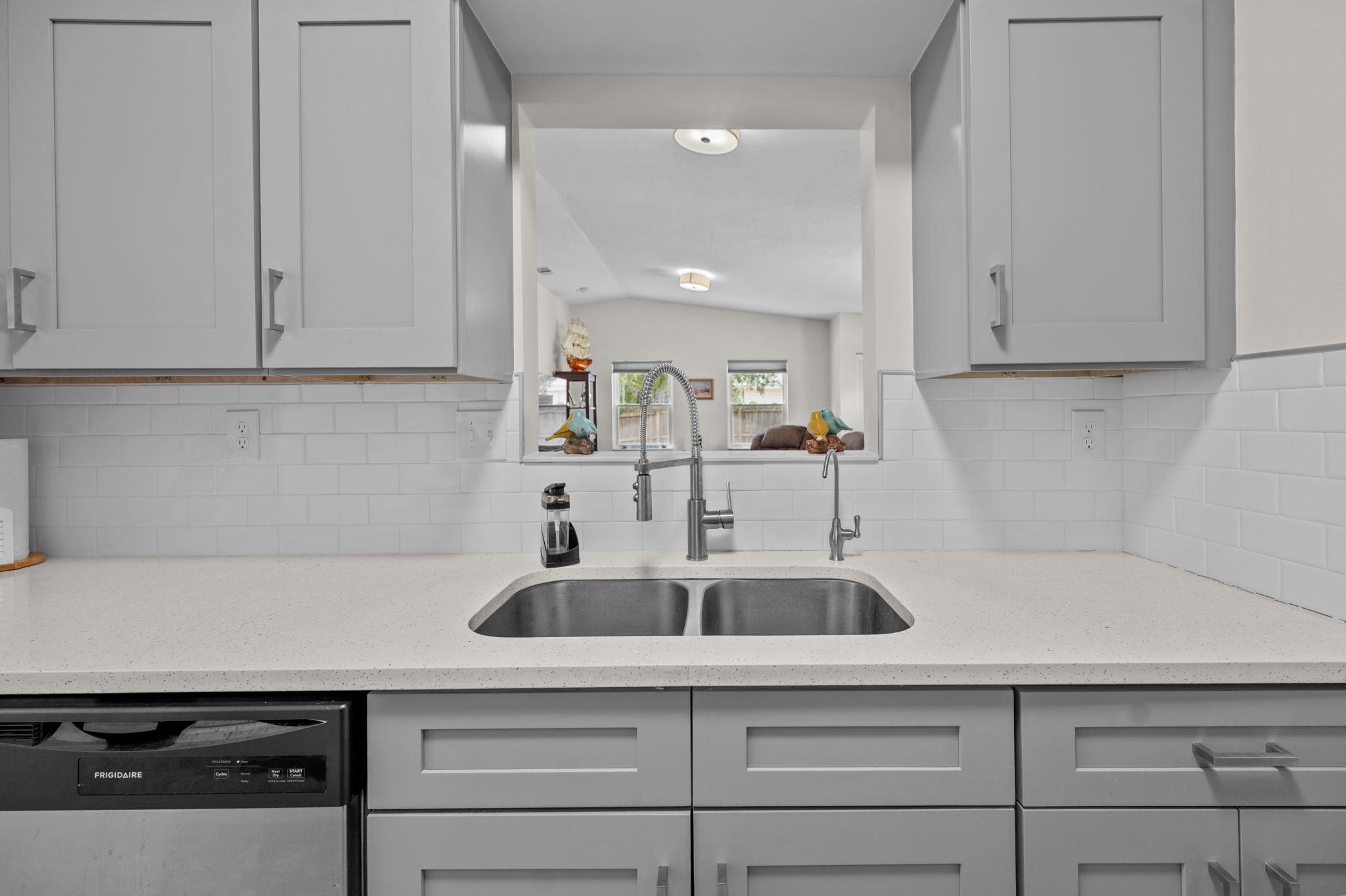 507 Gentian Road St. Augustine, FL 32086 - Photo 14 of 82 a kitchen with a sink and cabinets
