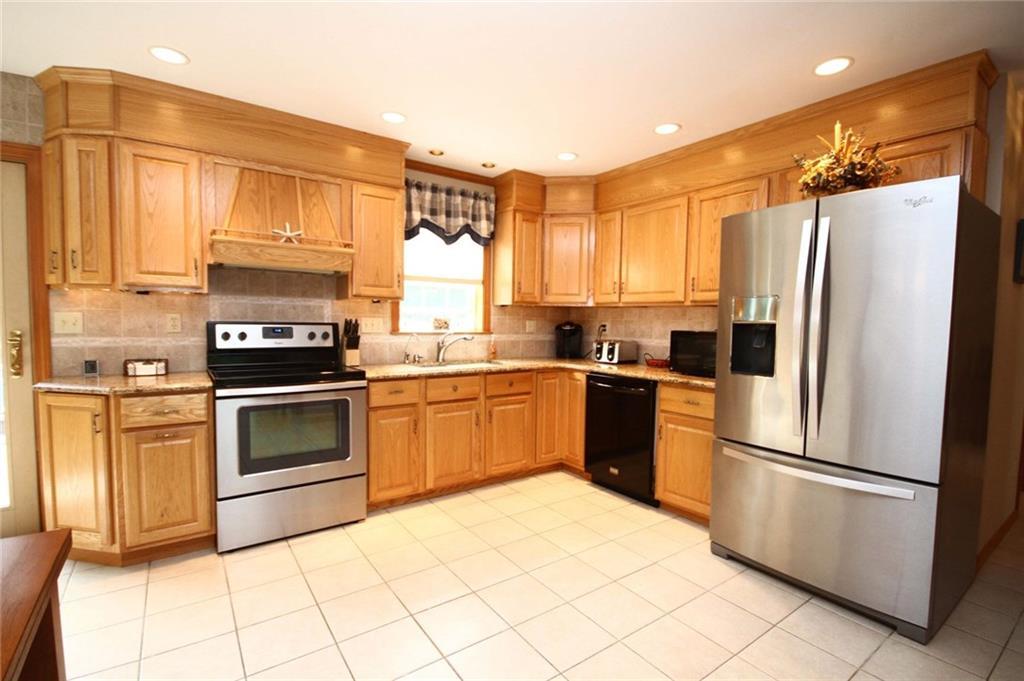 96 Natanis Ridge Circle Wells, ME 04090 - Photo 5 of 23 Gleaming Eat-In Kitchen