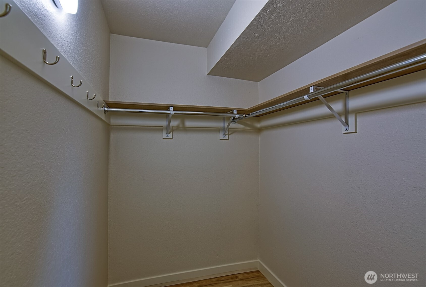 120 124th Street Southwest, Unit C8 Everett, WA 98204 - Photo 24 of 30 a view of room with racks on the wall