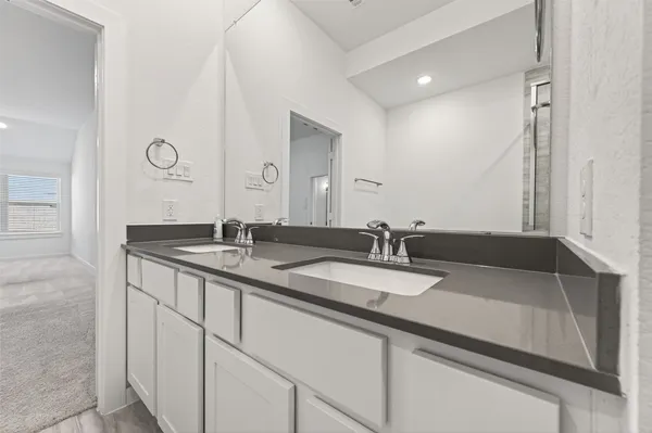 a spacious bathroom with a bathtub and a shower