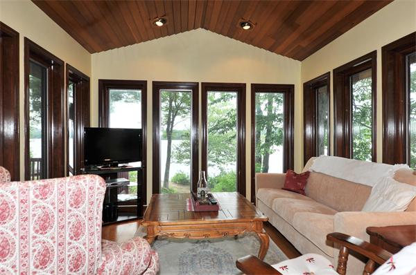 21 Island Road Ashburnham, MA 01430 - Photo 11 of 27 a living room with furniture and a flat screen tv