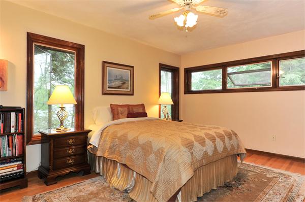 21 Island Road Ashburnham, MA 01430 - Photo 12 of 27 a bedroom with a bed and a window