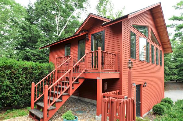 21 Island Road Ashburnham, MA 01430 - Photo 14 of 27 a view of a house with a yard front door