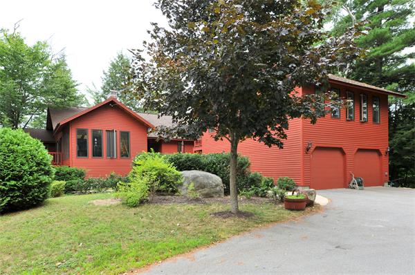 21 Island Road Ashburnham, MA 01430 - Photo 27 of 27 a front view of house with yard and trees around