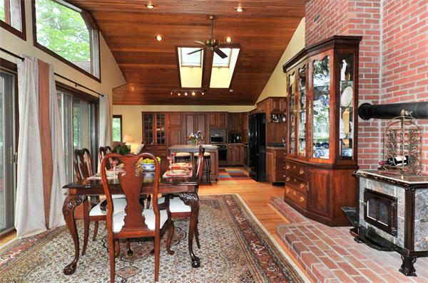 21 Island Road Ashburnham, MA 01430 - Photo 9 of 27 a view of a dining room with furniture window and wooden floor