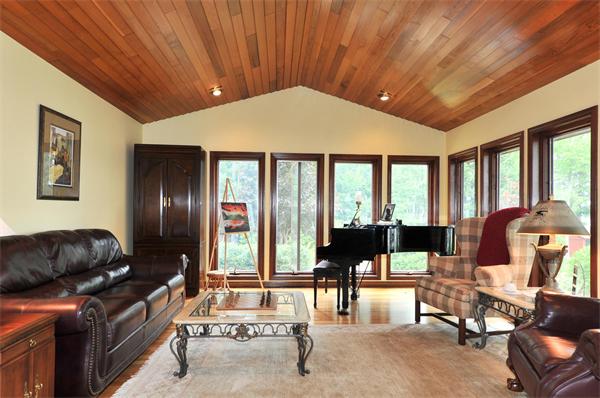 21 Island Road Ashburnham, MA 01430 - Photo 10 of 27 a bedroom with furniture and large windows