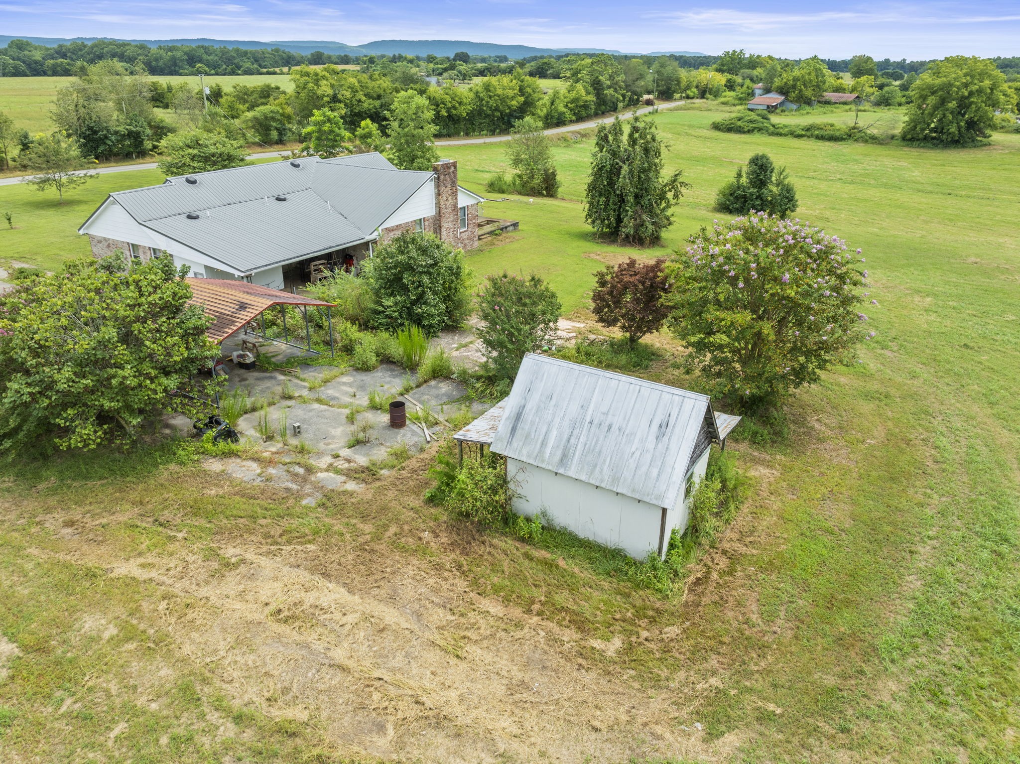 161 Stewarts Chapel Road Flintville, TN 37335 - Photo 15 of 39 an aerial view of a garden with houses