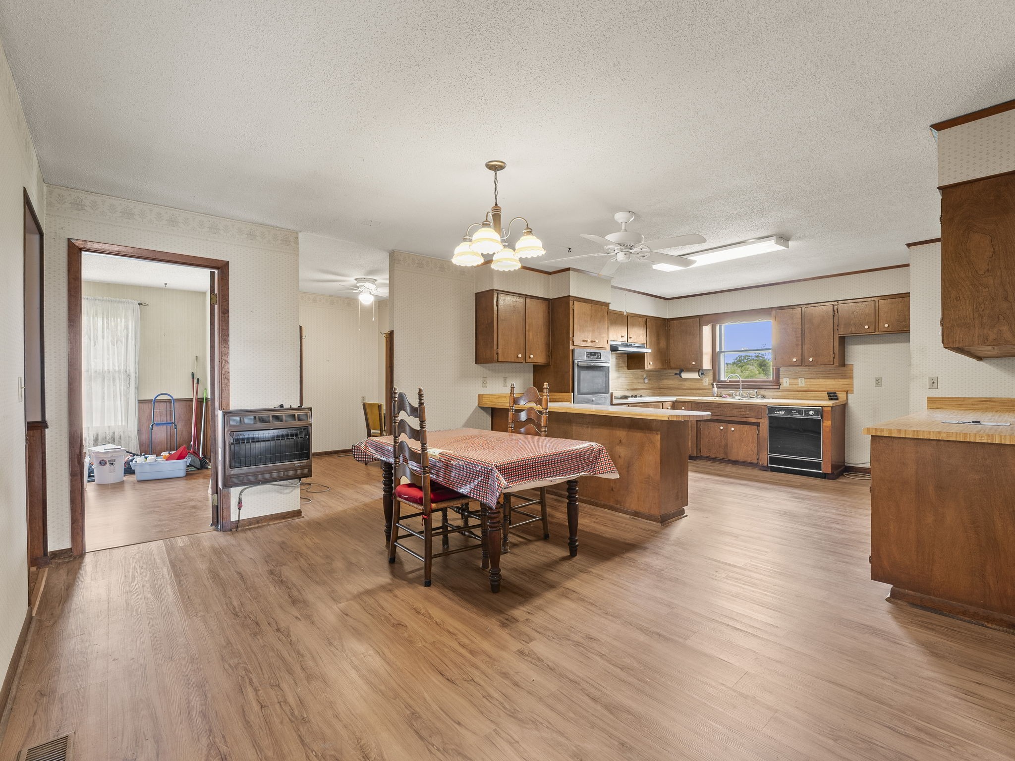 161 Stewarts Chapel Road Flintville, TN 37335 - Photo 20 of 39 a large kitchen with a table and chairs in it