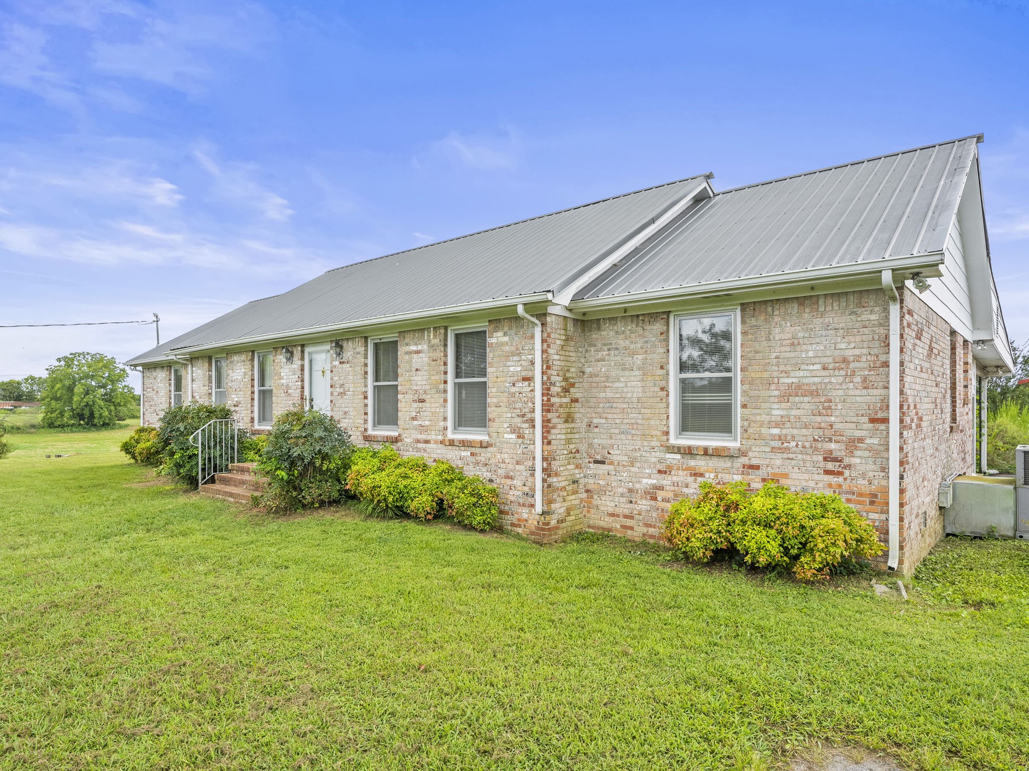 161 Stewarts Chapel Road Flintville, TN 37335 - Photo 2 of 39 a view of a house with garden