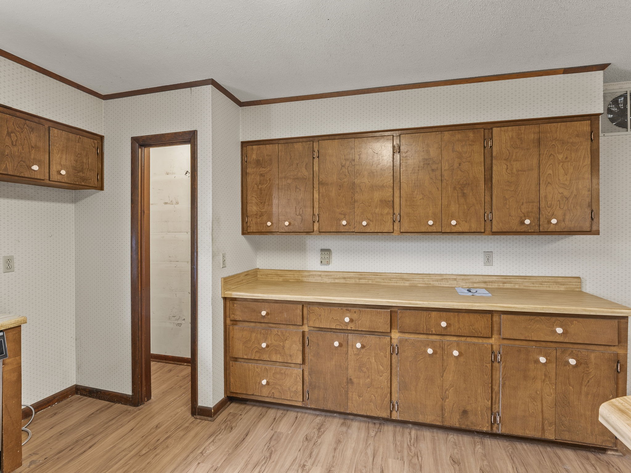 161 Stewarts Chapel Road Flintville, TN 37335 - Photo 25 of 39 a room with wooden cabinets and a sink