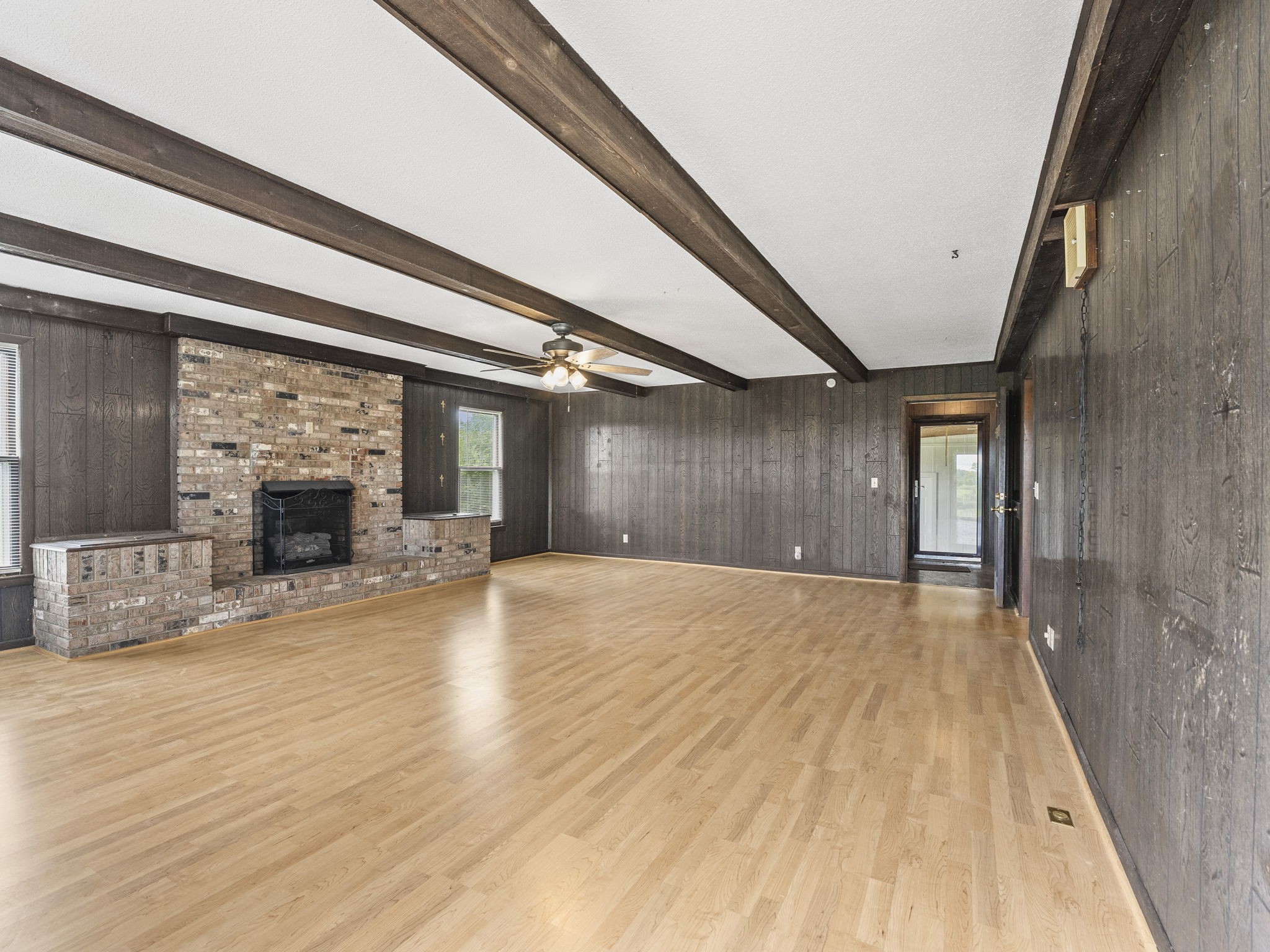161 Stewarts Chapel Road Flintville, TN 37335 - Photo 28 of 39 a view of an empty room with wooden floor and a window
