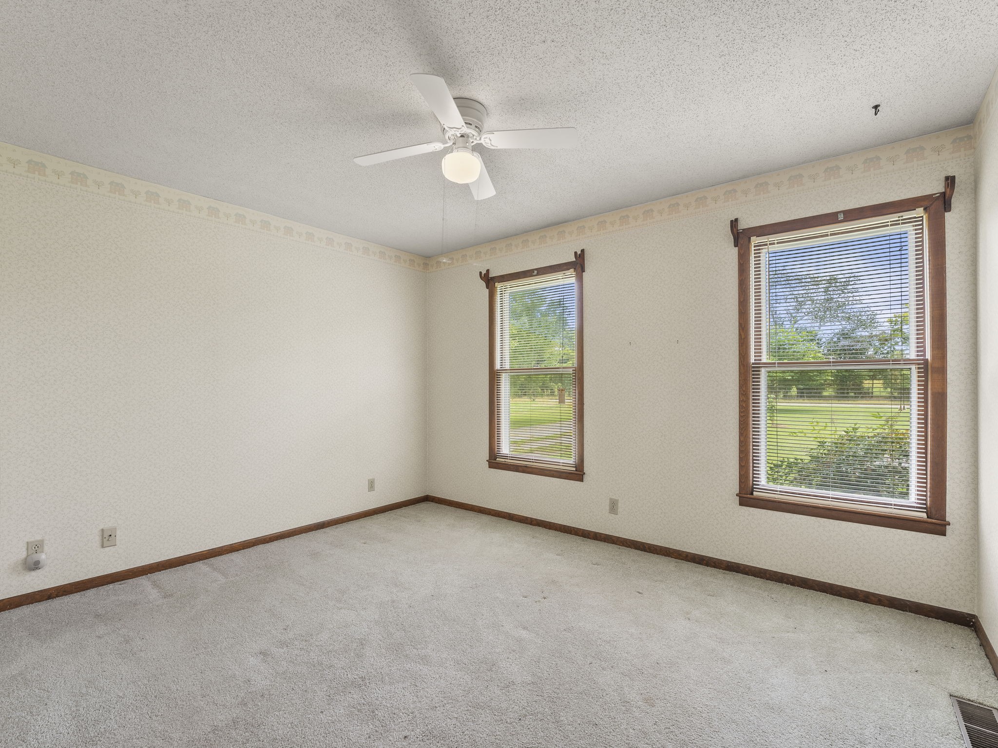 161 Stewarts Chapel Road Flintville, TN 37335 - Photo 39 of 39 an empty room with windows and closet