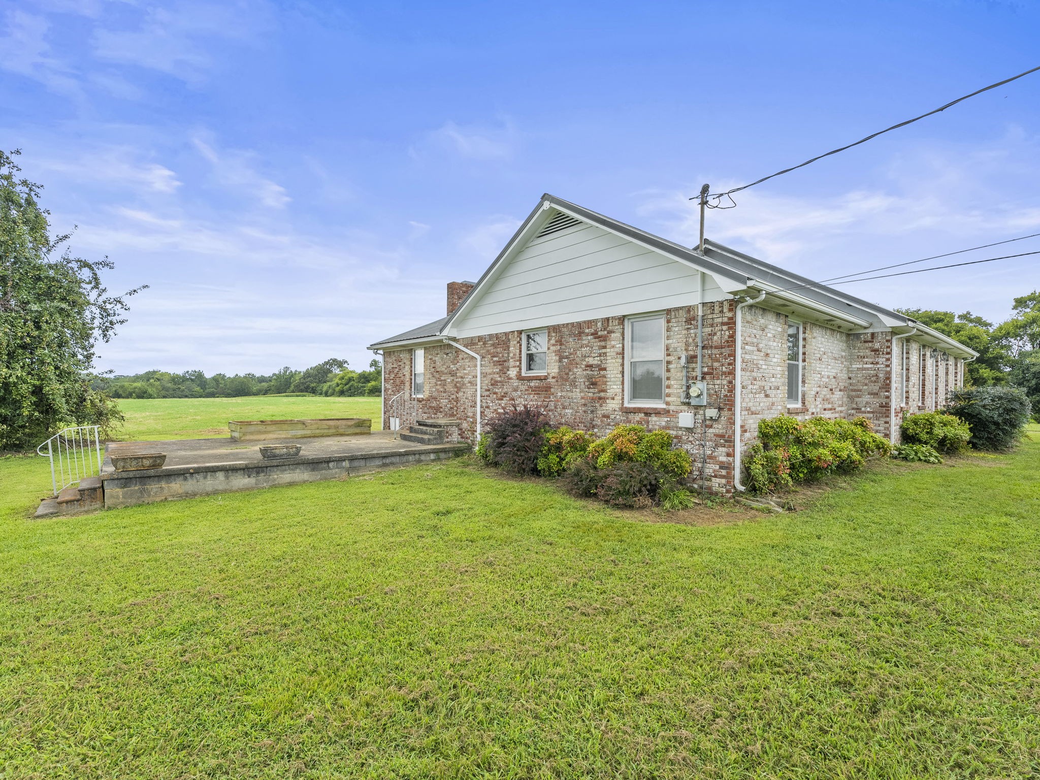 161 Stewarts Chapel Road Flintville, TN 37335 - Photo 6 of 39 a front view of house with yard and green space