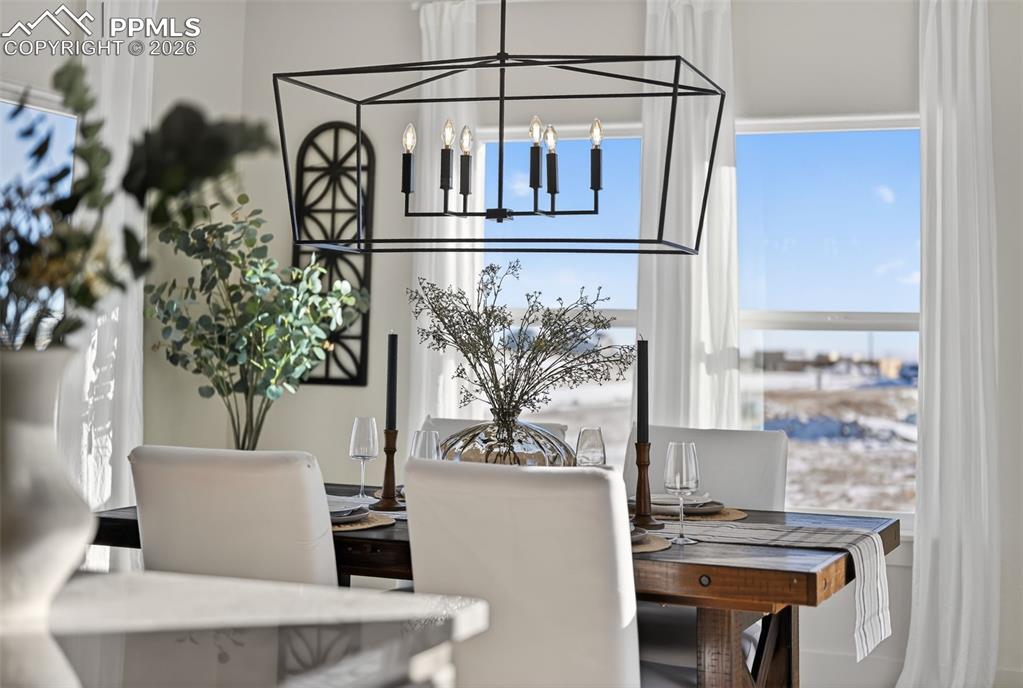 12955 Sunrise Ridge Drive Peyton, CO 80831 - Photo 23 of 49 a view of entryway and kitchen