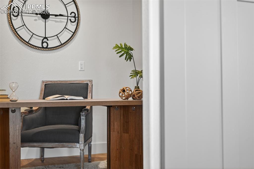 12955 Sunrise Ridge Drive Peyton, CO 80831 - Photo 28 of 49 a view of a dining room with furniture