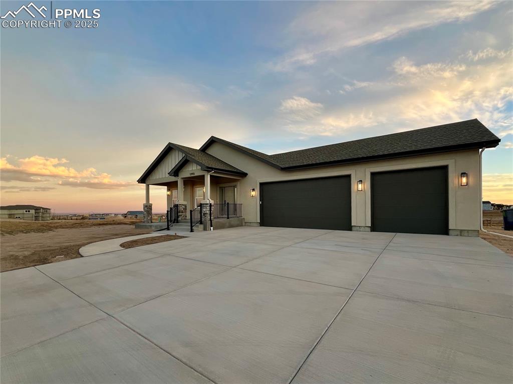 12955 Sunrise Ridge Drive Peyton, CO 80831 - Photo 41 of 49 a big room with an empty space