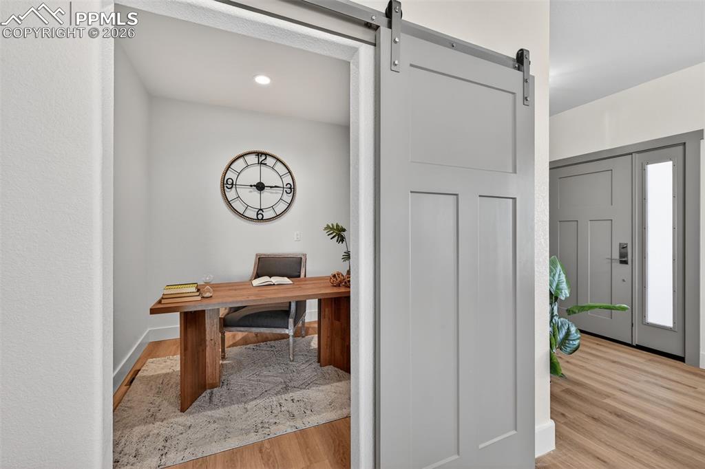 12955 Sunrise Ridge Drive Peyton, CO 80831 - Photo 8 of 49 a view of a room with a table and chairs