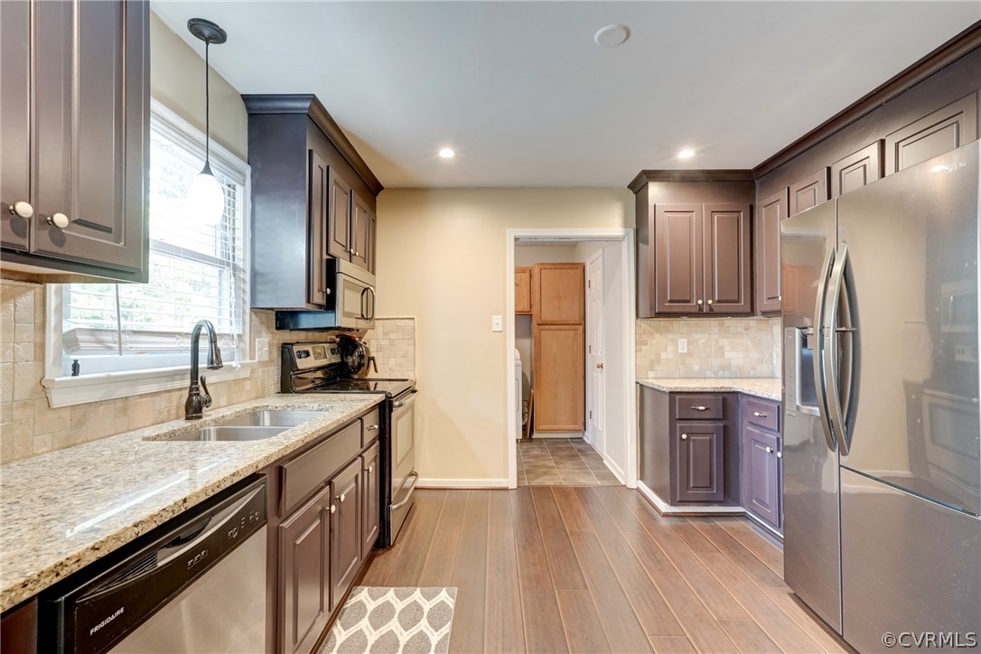 10618 Ridgerun Road Chesterfield, VA 23832 - Photo 12 of 36 a kitchen with stainless steel appliances granite countertop a refrigerator stove and sink