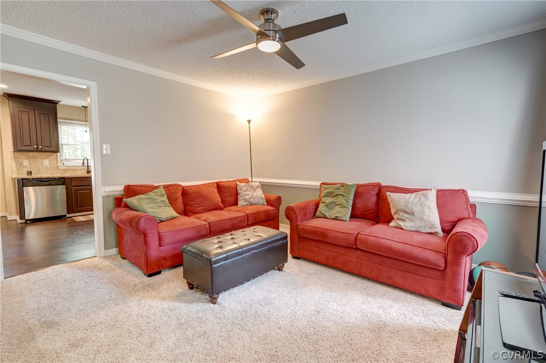 10618 Ridgerun Road Chesterfield, VA 23832 - Photo 16 of 36 a living room with furniture and a kitchen view