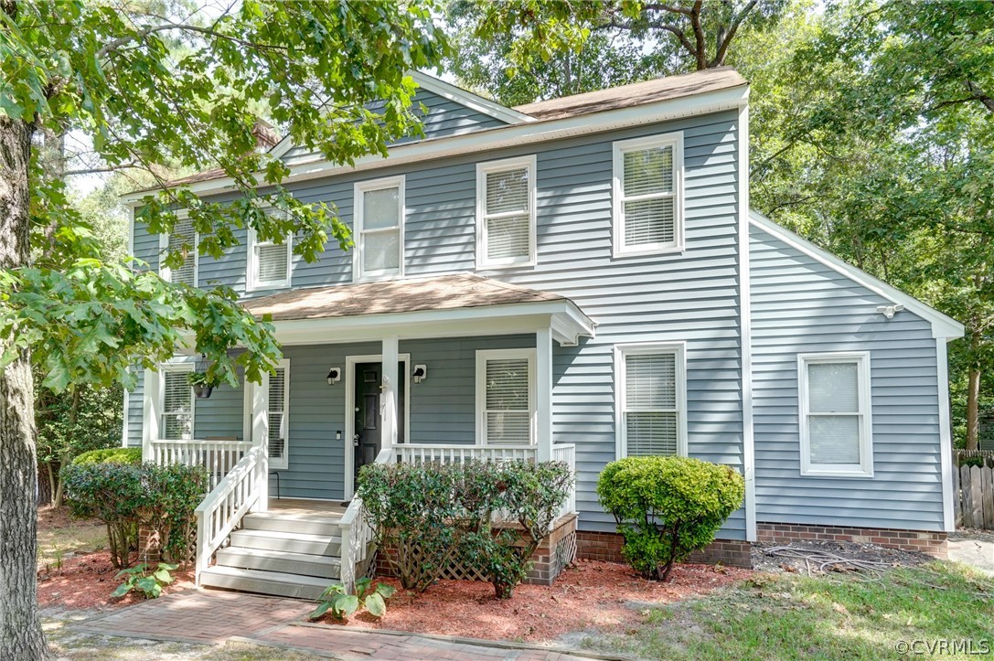 10618 Ridgerun Road Chesterfield, VA 23832 - Photo 2 of 36 a front view of a house with a yard