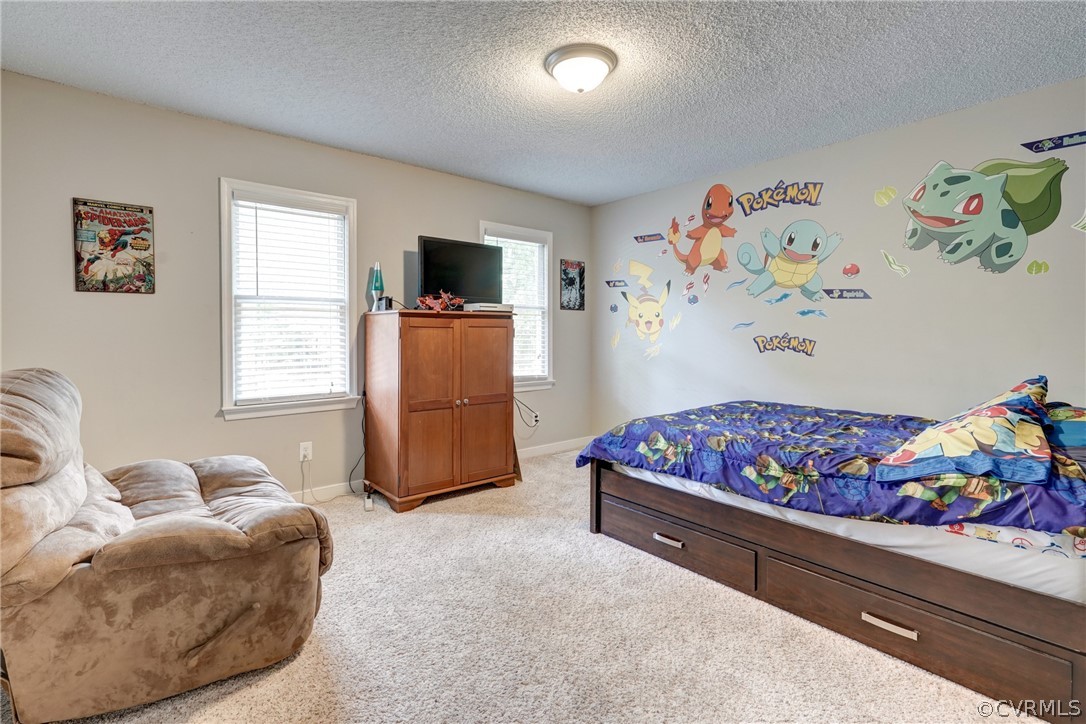 10618 Ridgerun Road Chesterfield, VA 23832 - Photo 21 of 36 a living room with furniture and a window