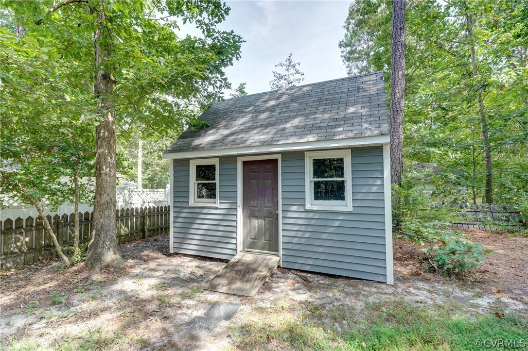 10618 Ridgerun Road Chesterfield, VA 23832 - Photo 35 of 36 a view of a house with a yard