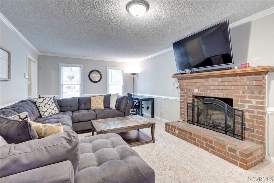 10618 Ridgerun Road Chesterfield, VA 23832 - Photo 8 of 36 a living room with furniture and a fireplace