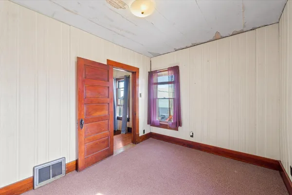 an empty room with windows