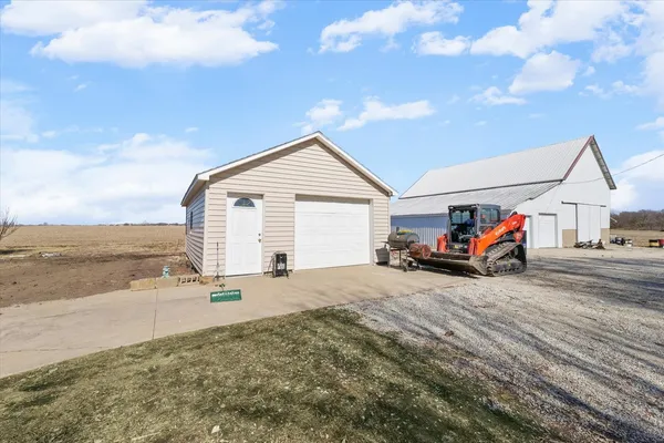 a view of a house with wooden floor and a ocean view
