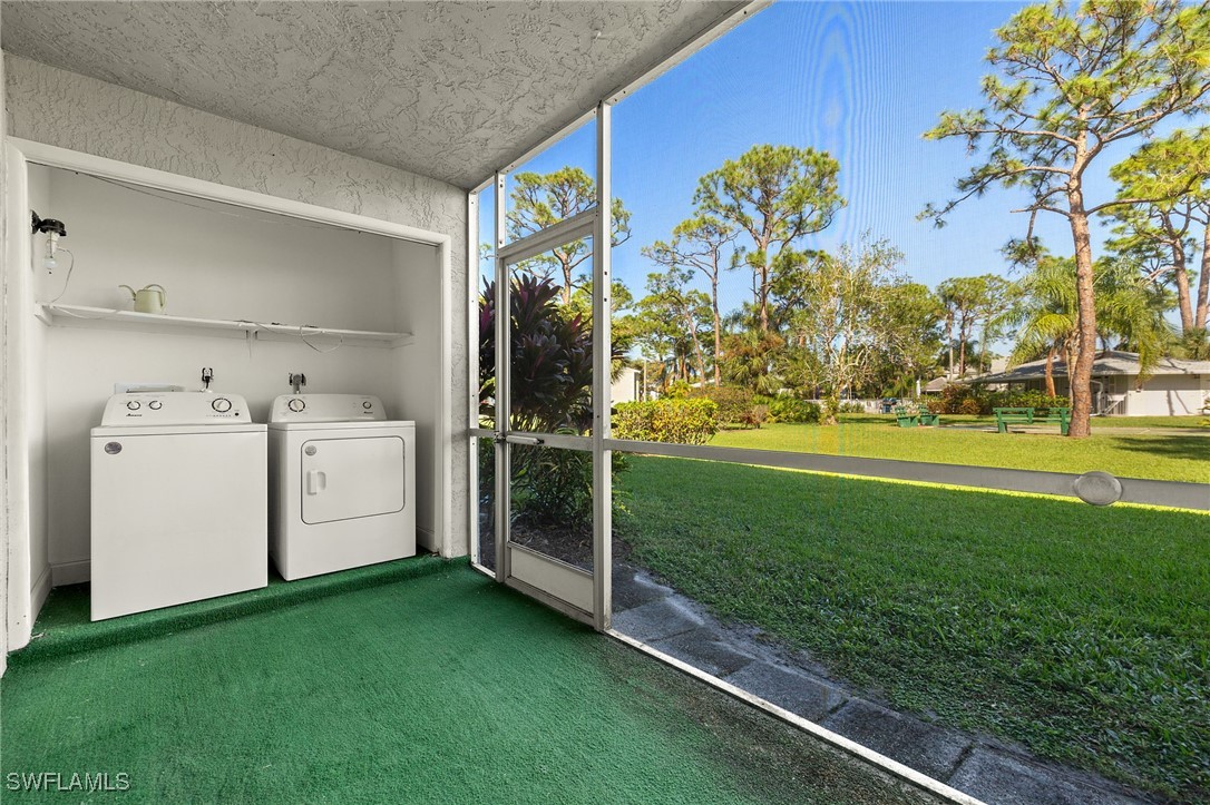 7068 Nantucket Circle, Unit 3 North Fort Myers, FL 33917 - Photo 14 of 17 a utility room with dryer and washer