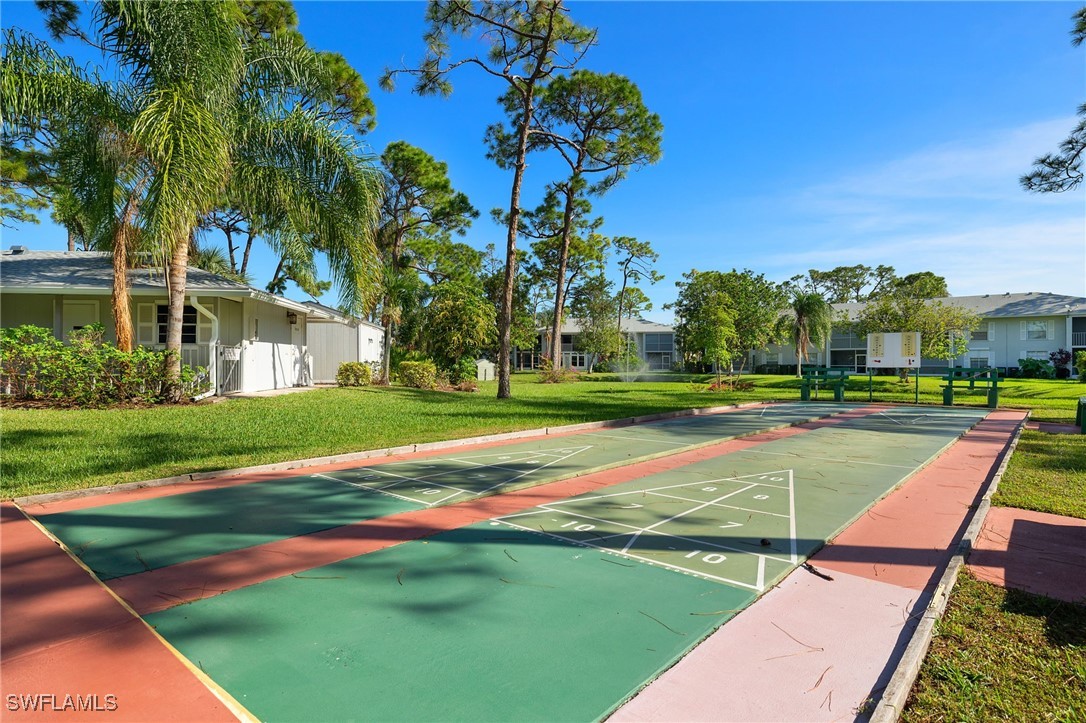 7068 Nantucket Circle, Unit 3 North Fort Myers, FL 33917 - Photo 17 of 17 a view of a volley ball court
