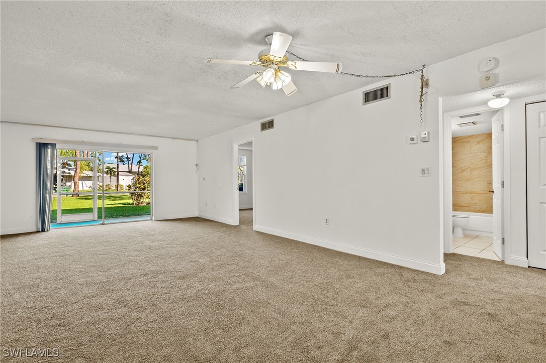 7068 Nantucket Circle, Unit 3 North Fort Myers, FL 33917 - Photo 5 of 17 a view of an empty room with a window