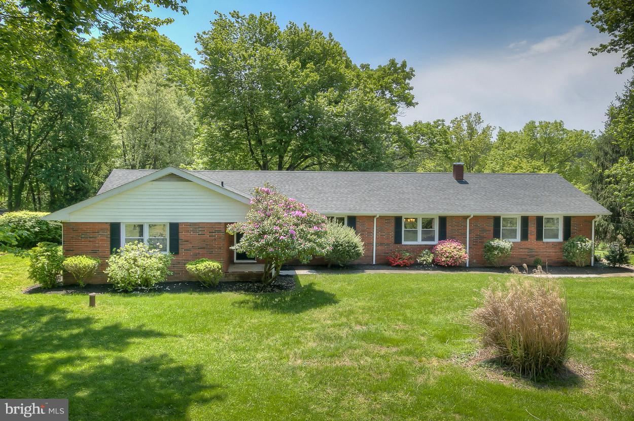 2801 Page Court Fallston, MD 21047 - Photo 1 of 30 a front view of a house with garden