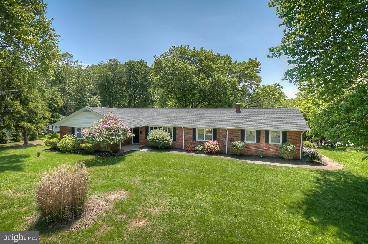 2801 Page Court Fallston, MD 21047 - Photo 2 of 30 a view of a house with a big yard plants and large trees