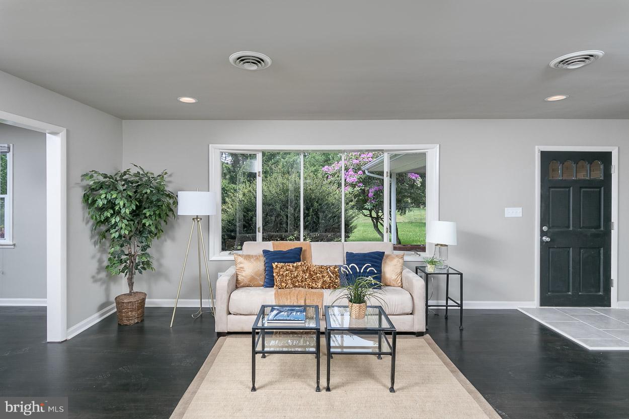 2801 Page Court Fallston, MD 21047 - Photo 11 of 30 a living room with furniture and a potted plant