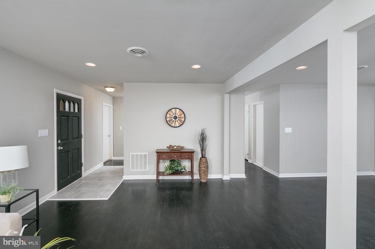 2801 Page Court Fallston, MD 21047 - Photo 19 of 30 a view of a livingroom with furniture wooden floor and window
