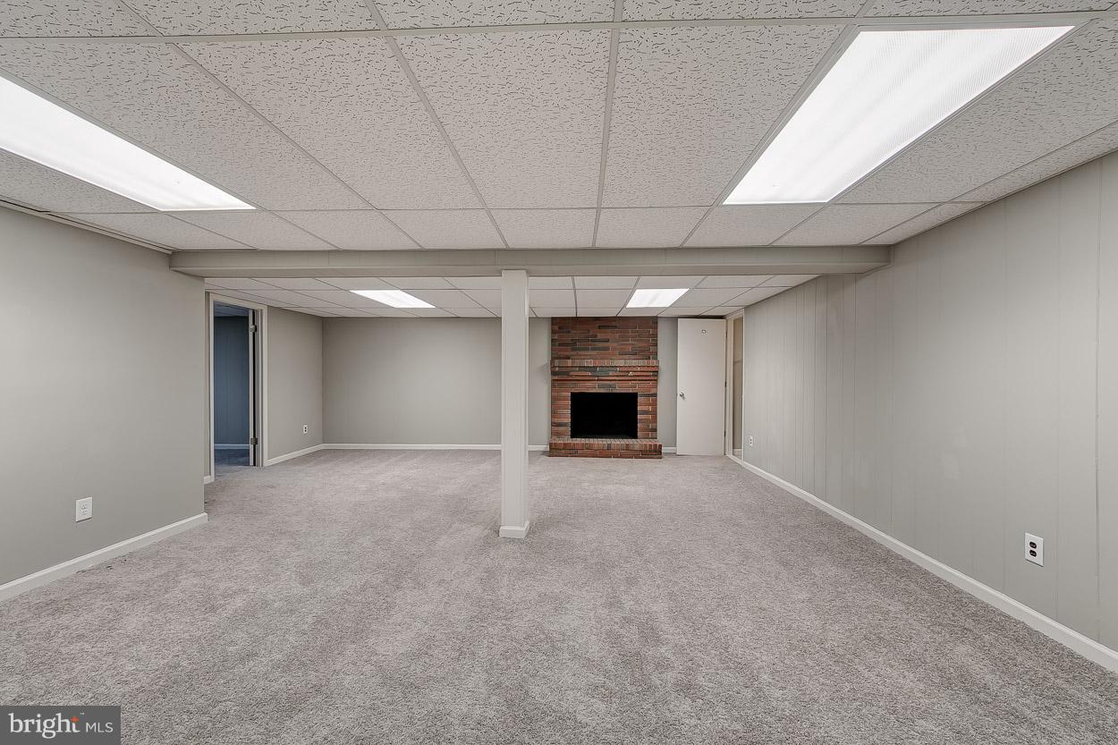 2801 Page Court Fallston, MD 21047 - Photo 26 of 30 a view of empty room with a fireplace