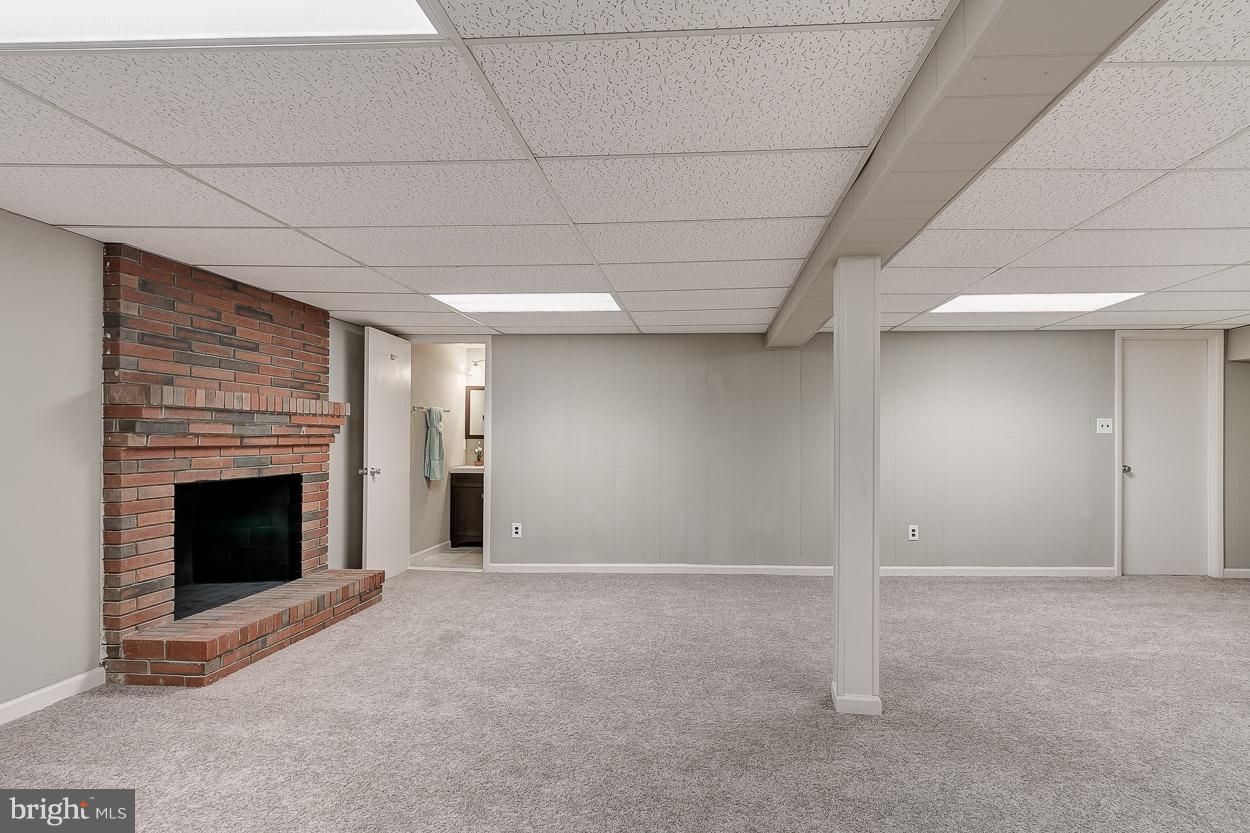 2801 Page Court Fallston, MD 21047 - Photo 28 of 30 a view of an empty room with a fireplace